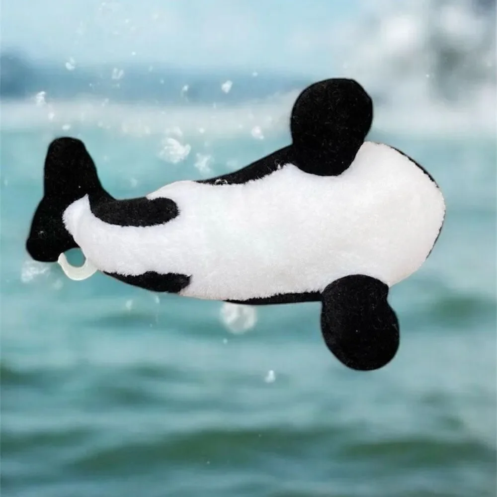 Lot of three stuffed animals from Sea World. One whale (Shamu) & 2 Penguins